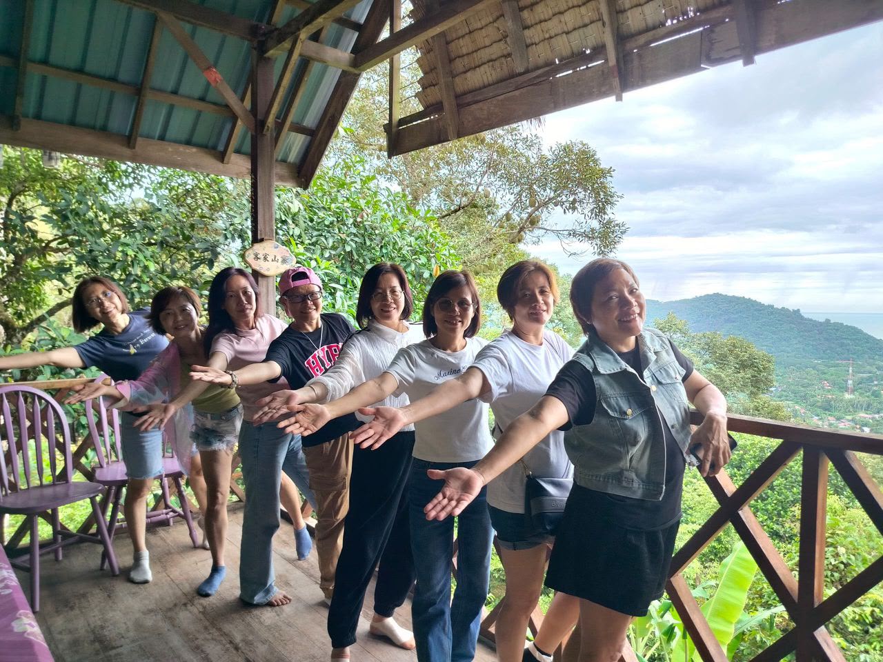 Friends gathering on the mountain-view terrace